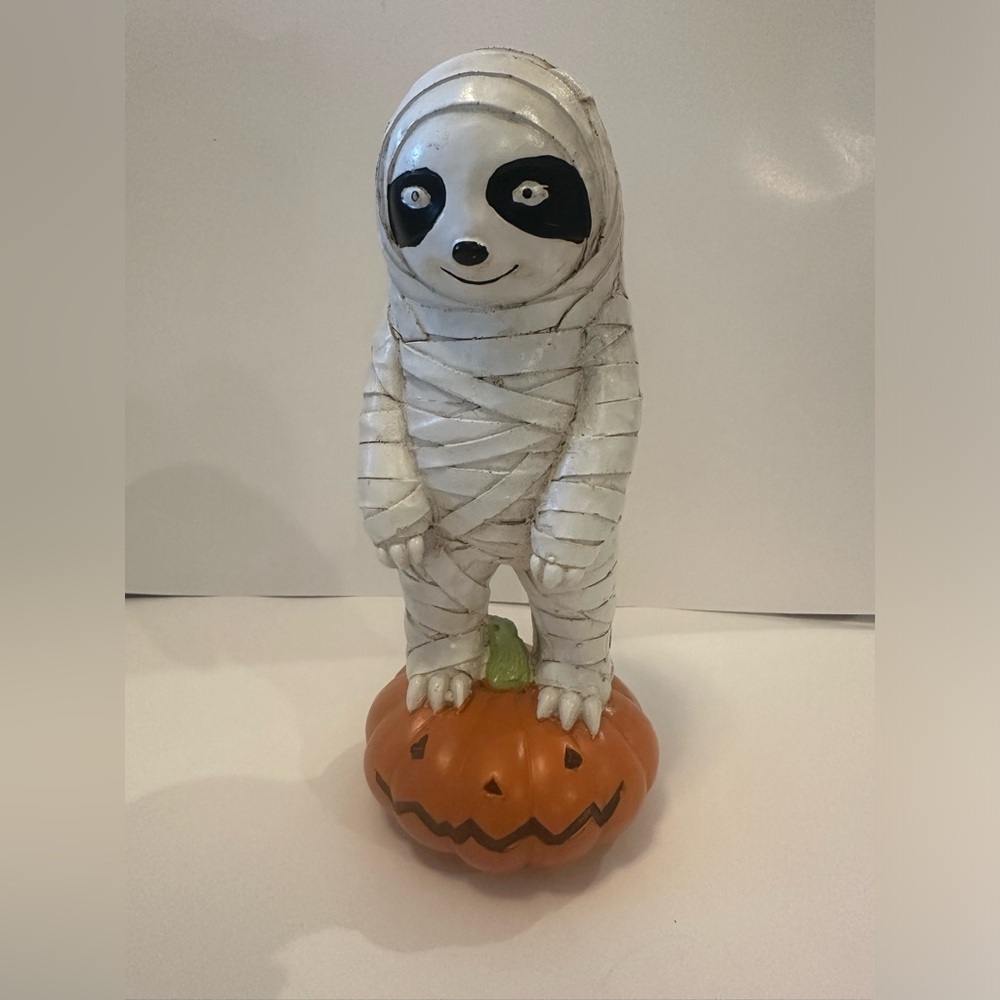 Viral Halloween sloth in mummy costume figurine